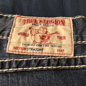 White and red stitch true religion jeans distressed